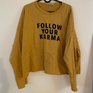 Cropped graphic sweater